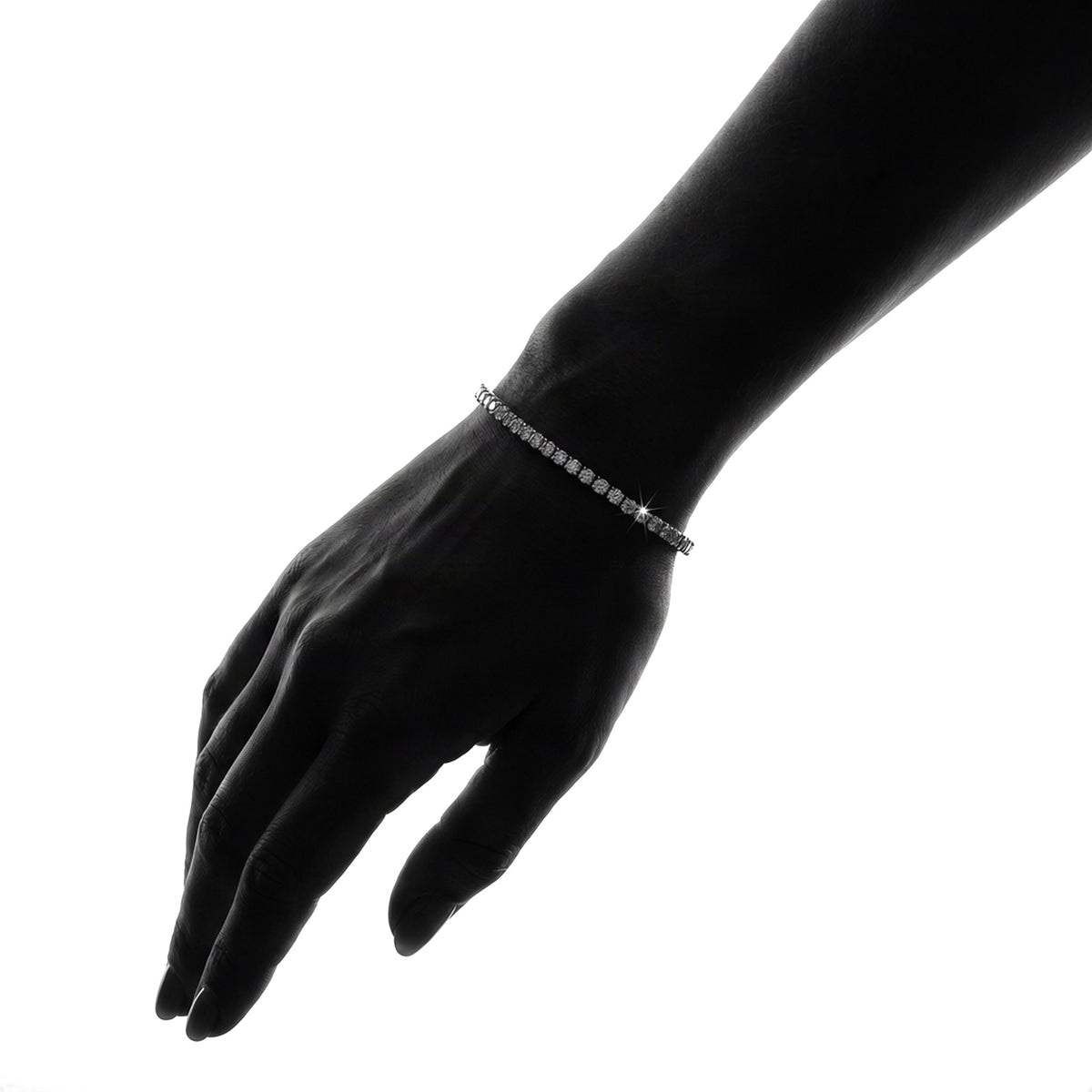 Silhouetted wrist wearing a 2mm lab-grown moissanite tennis bracelet (illustrative render)