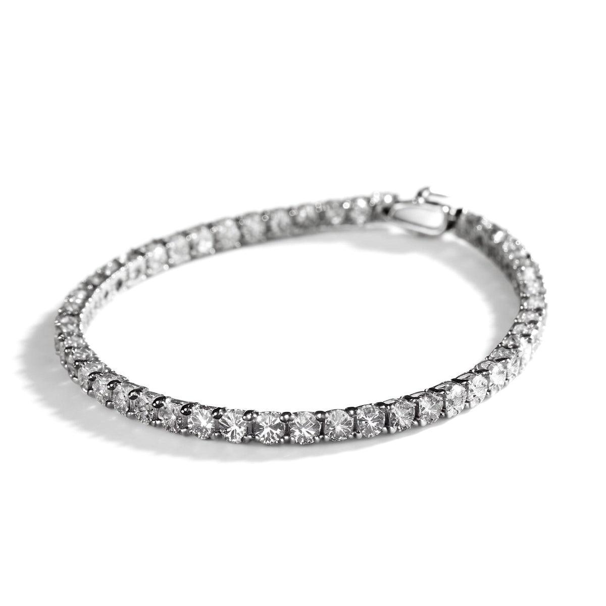 Lab-grown moissanite tennis bracelet with its box clasp, on white (illustrative render)